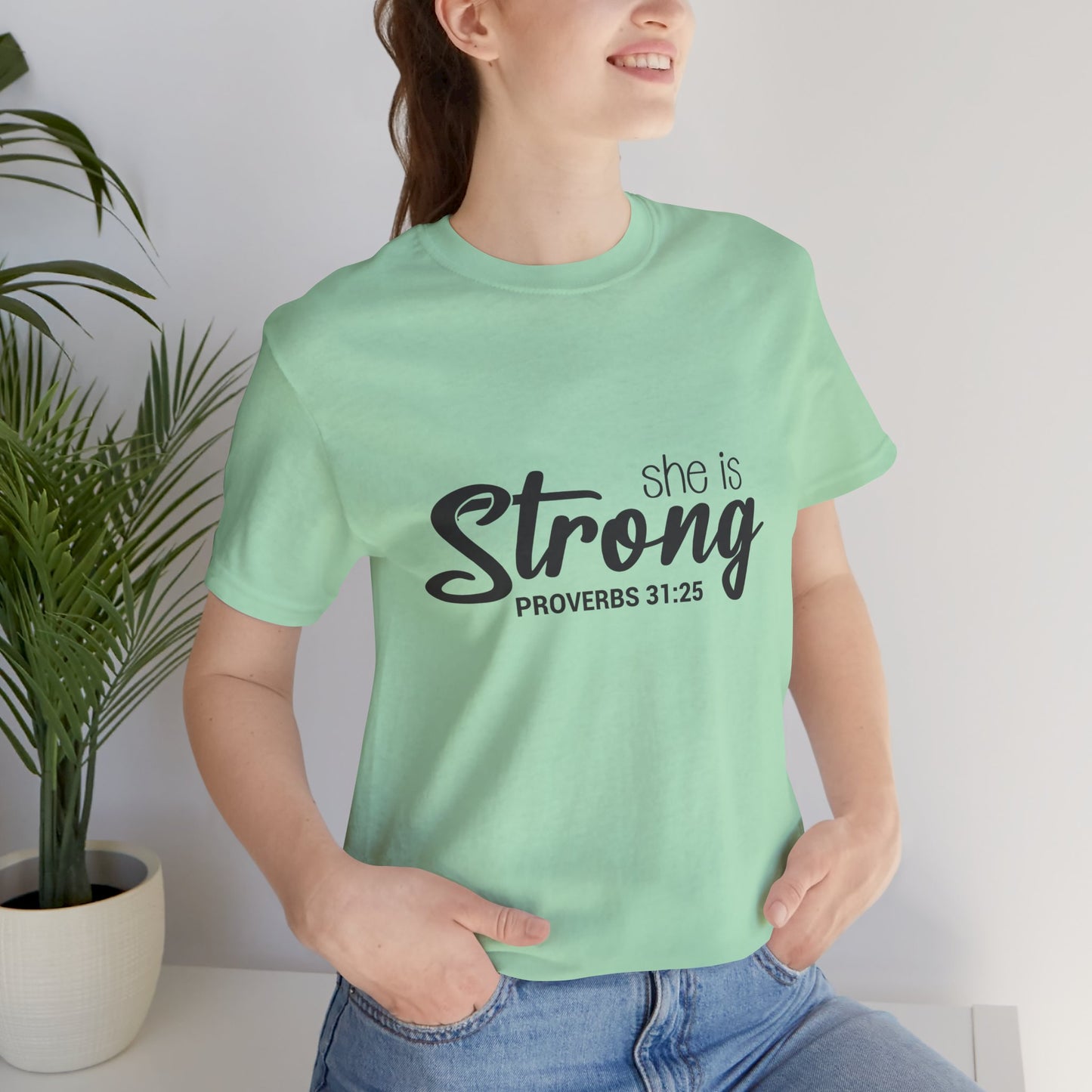 "She is Strong" Unisex Jersey Short Sleeve Tee
